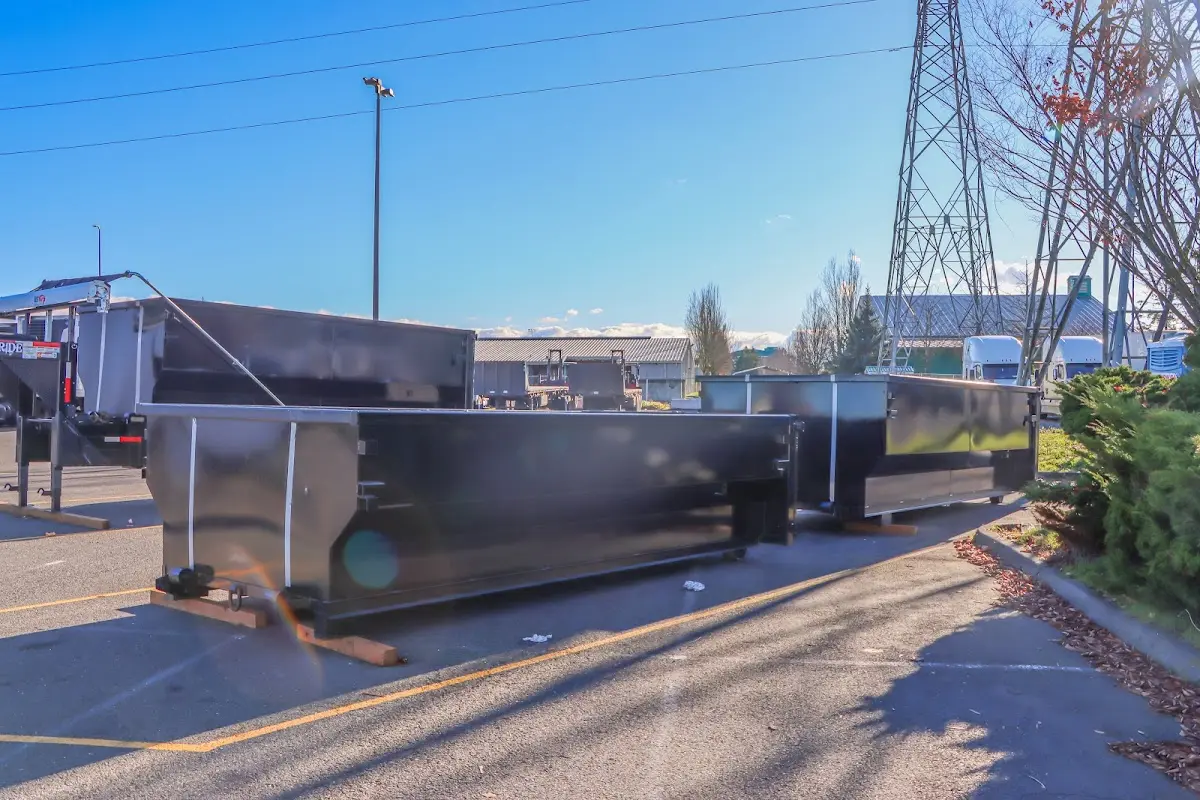 Roll-off dumpster ready for waste disposal at job site for 2 Yard Dumpster Rental in West St. Paul